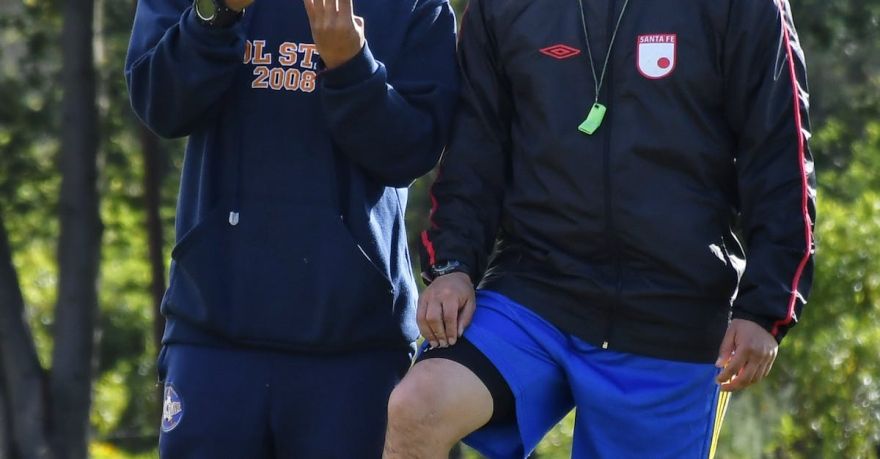 Soccer Strategie - Coach Explaining a Strategy to a Soccer Player